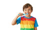© Nonna - Happy Boy in Rainbow Shirt Brushing Teeth on Transparent Background