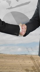 Leinwandbilder - Handshake between two businessmen with graphs and statistics 4k