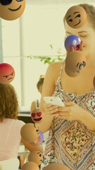 Poster - Animation of media icons over happy diverse business people using smartphone