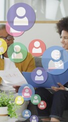 Poster - Animation of media icons over diverse business people in office