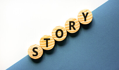 Fototapete - Story symbol. Concept word Story on beautiful wooden circles. Beautiful white and blue background. Business lifestyle story concept. Copy space.