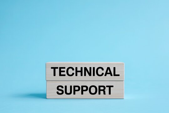 Wooden blocks stacked with the words technical support clearly printed in black text against a solid light blue background