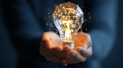 Poster - Glowing Lightbulb with Network Connections Held in Hands