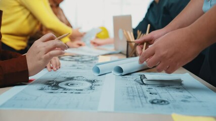Poster - A vibrant scene of diverse professionals collaborating in a modern workspace, actively discussing ideas and sharing sketches while utilizing digital devices for creative project development. SACTR