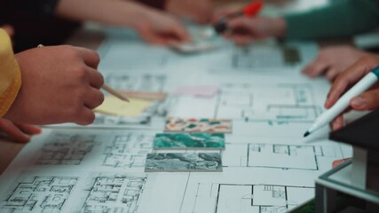 Poster - A dynamic workspace scene showcasing diverse hands engaged in project planning and brainstorming on construction blueprints, highlighting creativity and teamwork. SACTR