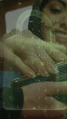 Poster - Animation of digital padlock over hands of caucasian woman using payment terminal and smartphone