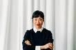 © Studio Firma/Stocksy - Confident Asian woman