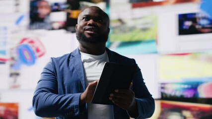 Poster - Black social media manager browses high tech environment with app icons, infographics and social networking feeds. Examining social big data on web platforms, digital influence. Camera B.