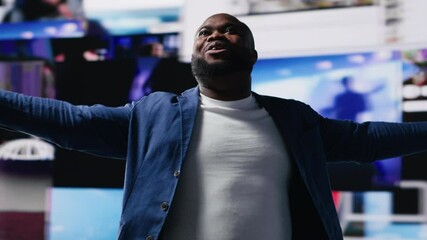 Poster - African American professional browses high tech environment with app icons, infographics and social networking feeds. Showcases big data on social media platforms, digital influence. Camera B.
