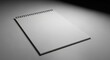 © Ryan - Blank Notebook with Wire Binding on Gray Surface for Writing