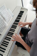 © Irina Polonina/Stocksy - Fingers Dance Over Piano Keys in a Serene Music Moment