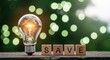 © Shayful Islam GFX - Energy Efficiency Light Bulb with 'SAVE' Blocks Emphasizing Conservation and Eco-Friendly Practices