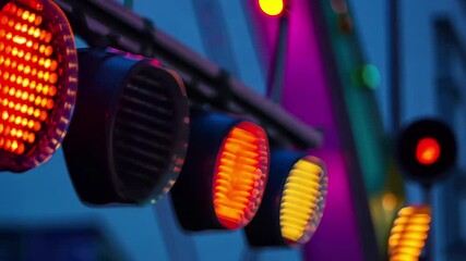 Poster - Colorful stage lights illuminate the fairground at night creating a vibrant atmosphere, Stage lights at the local fair, defocused background
