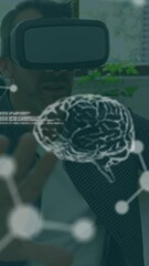 Poster - Animation of scientific data over caucasian man wearing vr headset in office