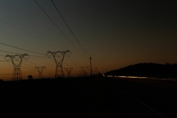 Poster - The evening electricity pylon silhouette