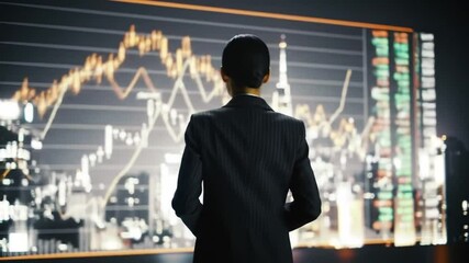Poster - Businesswoman Observes Financial Data and Cityscape Projection Indoors in Dim Lighting