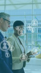 Poster - Animation of people icons over caucasian businesspeople networking