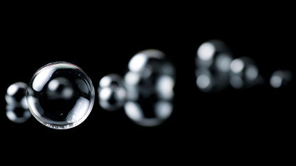 Aufkleber - Isolated water bubbles with sharp reflections on black background, floating and creating sense of calm and clarity