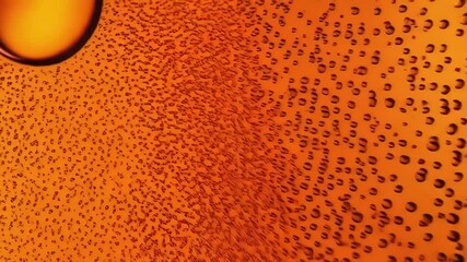 Poster - An abstract macro image shows orange oil and water bubbles creating a textured background