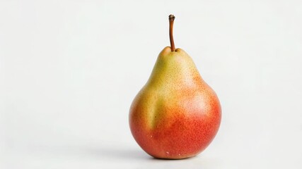 Poster - A single ripe pear sitting on a white background