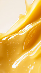 Poster - Smooth golden liquid glistening under bright light in a close-up view