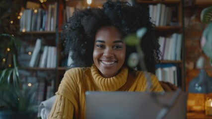 Poster - A woman sitting in front of a laptop computer, typing away