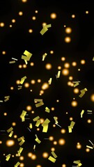 Poster - Golden confetti and glowing spots moving against black background