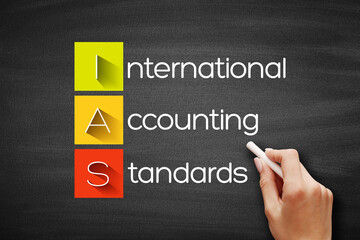 Aufkleber - IAS - International Accounting Standards acronym, business concept background on blackboard