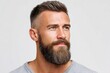 © Gatherina - Handsome bearded man looking up on white background