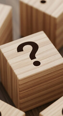 Poster - Close-up of wooden cube with question mark, light brown wood grain texture, showcasing uncertainty or inquiry concept