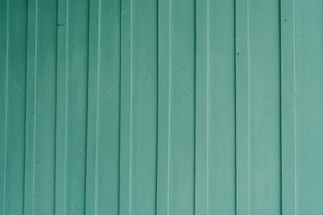 Poster - Green background. Textured teal wooden wall with vertical planks and shadows, perfect for backgrounds or design projects