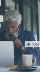 Poster - Animation of social media icons and numbers over african american businessman with laptop