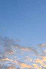 Wall Mural - half moon floating on blue sky in twilight background 