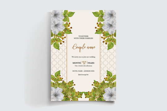 WEDDING INVITATION FRAME WITH FLOWER DECORATIONS AND FRESH LEAVES