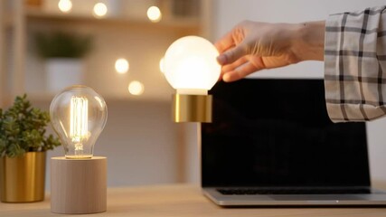 Poster - Modern Warm Workspace Decor Stylish Desk with Round Light Bulb, Laptop, and Decorative Plant for Cozy Home Ambiance