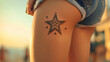 © Ayu - Star Tattoo on Thigh with Sunrise Scene