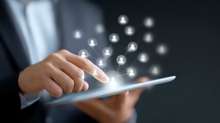 Poster - Professional in business suit holds digital tablet with glowing network of people icons floating above, representing digital connectivity and social networking.