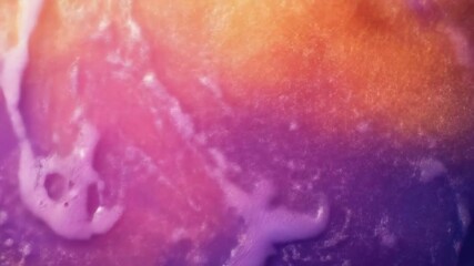 Wall Mural - Swirling mixture of pink, orange and violet colors with blurred effect