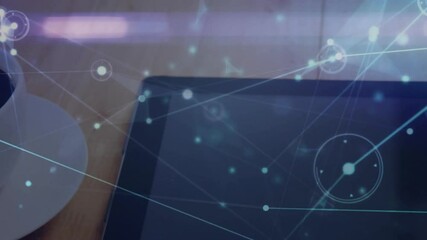 Poster - Animated network drifting across tablet sparking cup sliding into view to show digital workspace