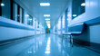 © Curioso.Photography - A long, blurred hospital corridor with a bright light at the end conveys a sense of depth and a clinical, futuristic atmosphere.