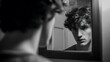 © Muhammad - A monochrome portrait of a young man with curly hair looking at his reflection mirror