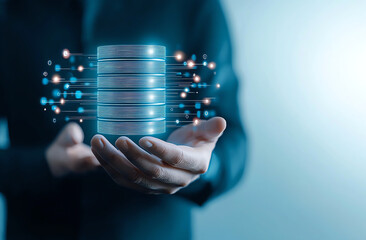Poster - Businessman holding virtual data storage icon, showcasing technology and innovation in data management. image conveys sense of modernity and digital transformation