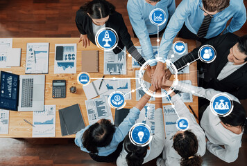 Poster - Aerial view of diverse team members engaged in a collaborative business meeting, showcasing active discussion, strategic planning, and data analysis for project success. Amity