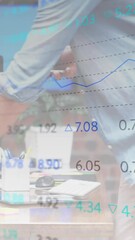 Poster - Animation of financial data processing over caucasian businessman in office