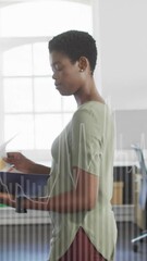 Poster - Animation of financial data processing over businesswoman in office