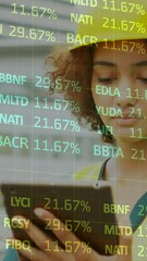 Poster - Animation of financial data processing over female architect using tablet
