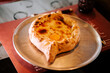 © Darius - Delicious traditional Adjarian khachapuri served on a plate with a runny egg on top