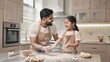 © IRINA - A father and daughter bake together in a modern kitchen. The father is a young South Asian man with a beard. The daughter is a young South Asian girl with long hair. Flour is scattered on the counter.