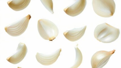 Poster - Fresh onions cut in half lying on a clean white surface, ready for use or decoration