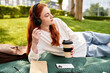 © Bliss - Enjoying a quiet afternoon in the park while sipping coffee and listening to music